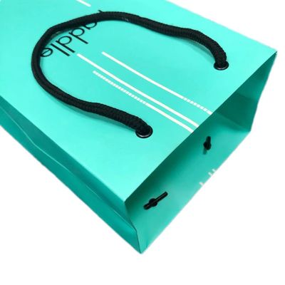 Sac de cadeau en papier vert mat de luxe pour l'emballage de vêtements