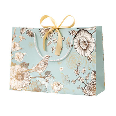 Sac en papier sur mesure en gros en papier écologique en magasinage emballage sac cadeau sac en papier imprimé avec votre propre logo