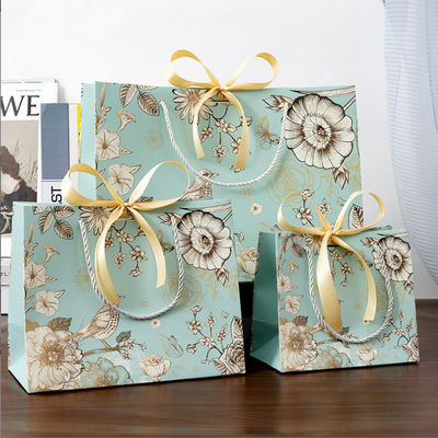 Sac en papier sur mesure en gros en papier écologique en magasinage emballage sac cadeau sac en papier imprimé avec votre propre logo