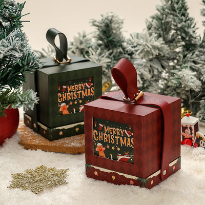 Coffret cadeau de Noël de luxe au design élégant or et rouge pour les célébrations familiales