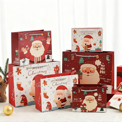 Sacs de Noël en kraft imprimé de tailles personnalisées, sacs cadeaux de luxe avec poignée en ruban